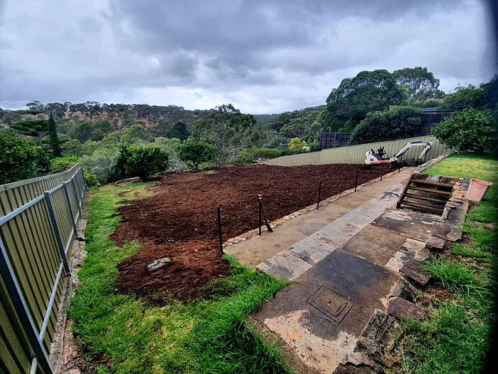 A reclaimed back yard where an in-ground pool used to be