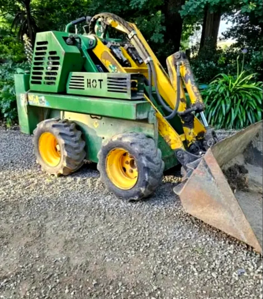 Mr Earthworx mini loader working on a residential site